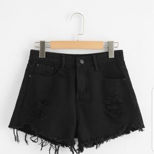 Black distressed shorts
